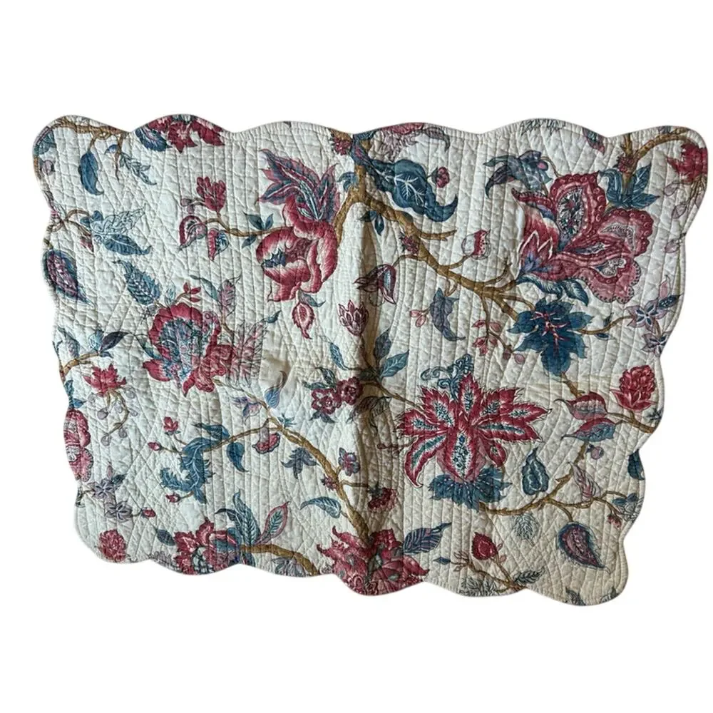 2 quilted floral standard pillow shams from Pottery Barn ?